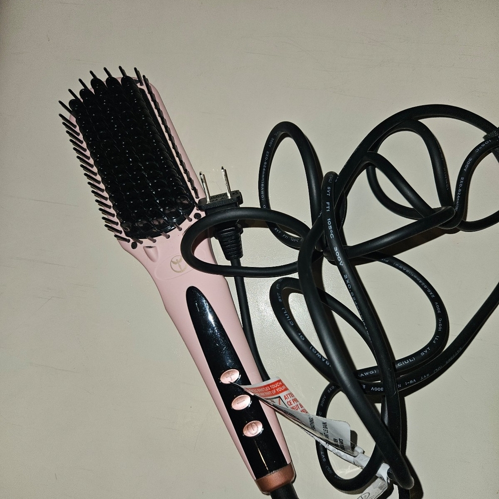 Sleek Pink Hair Straightening Brush